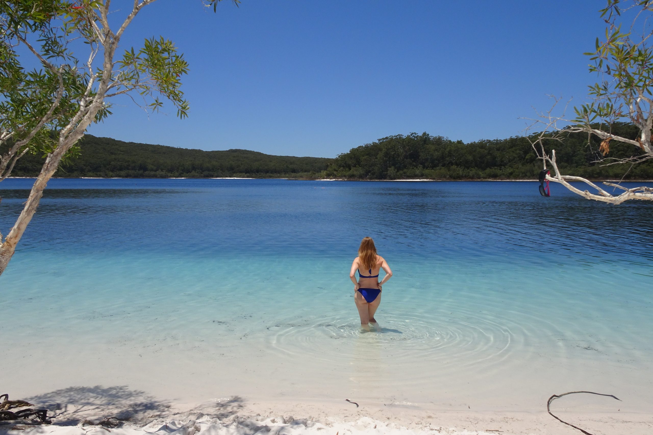 Girl Standing In Lake Mackenzie on K'Gari Fraser Island Australia
