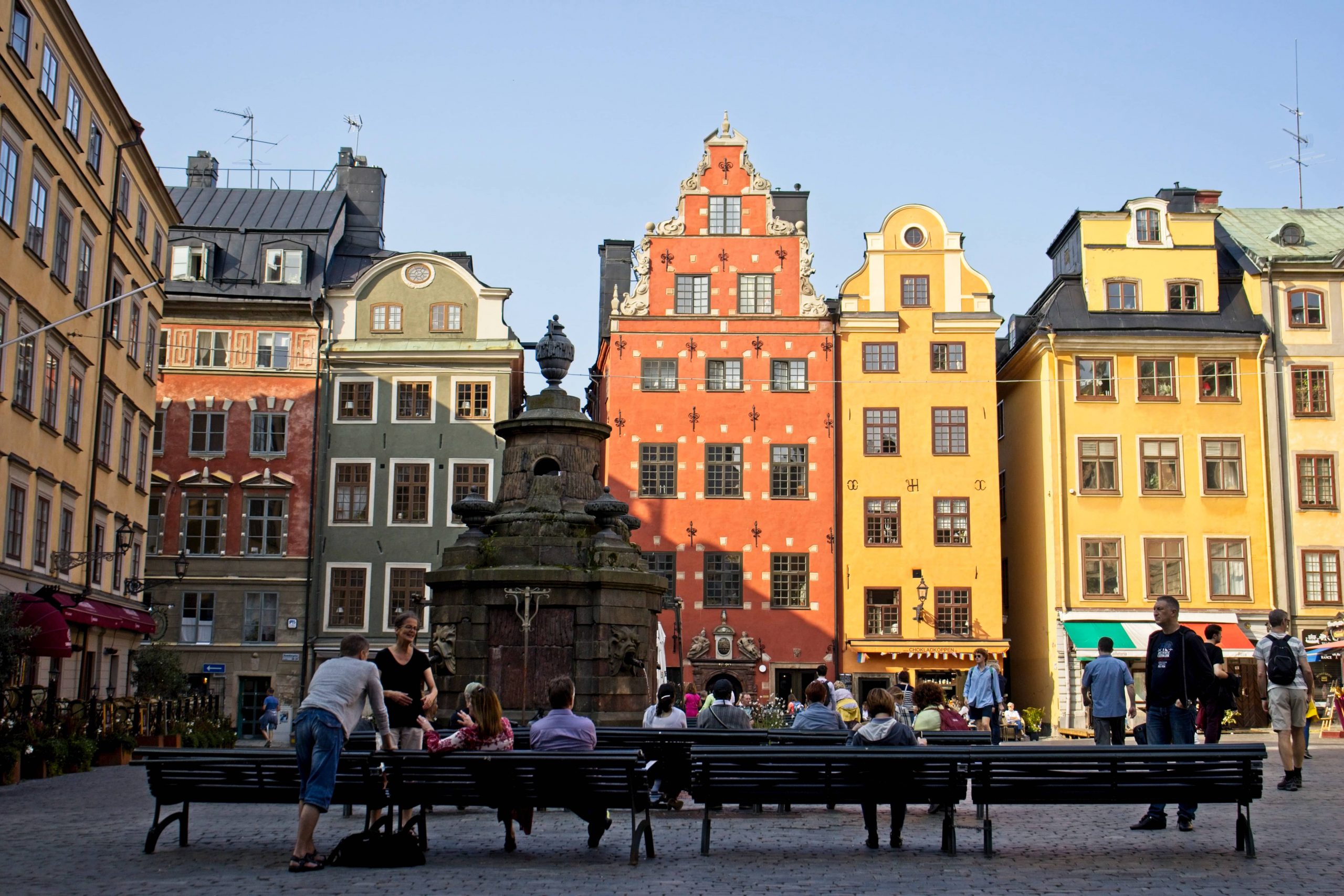 People on benches in Stockholm Sweden