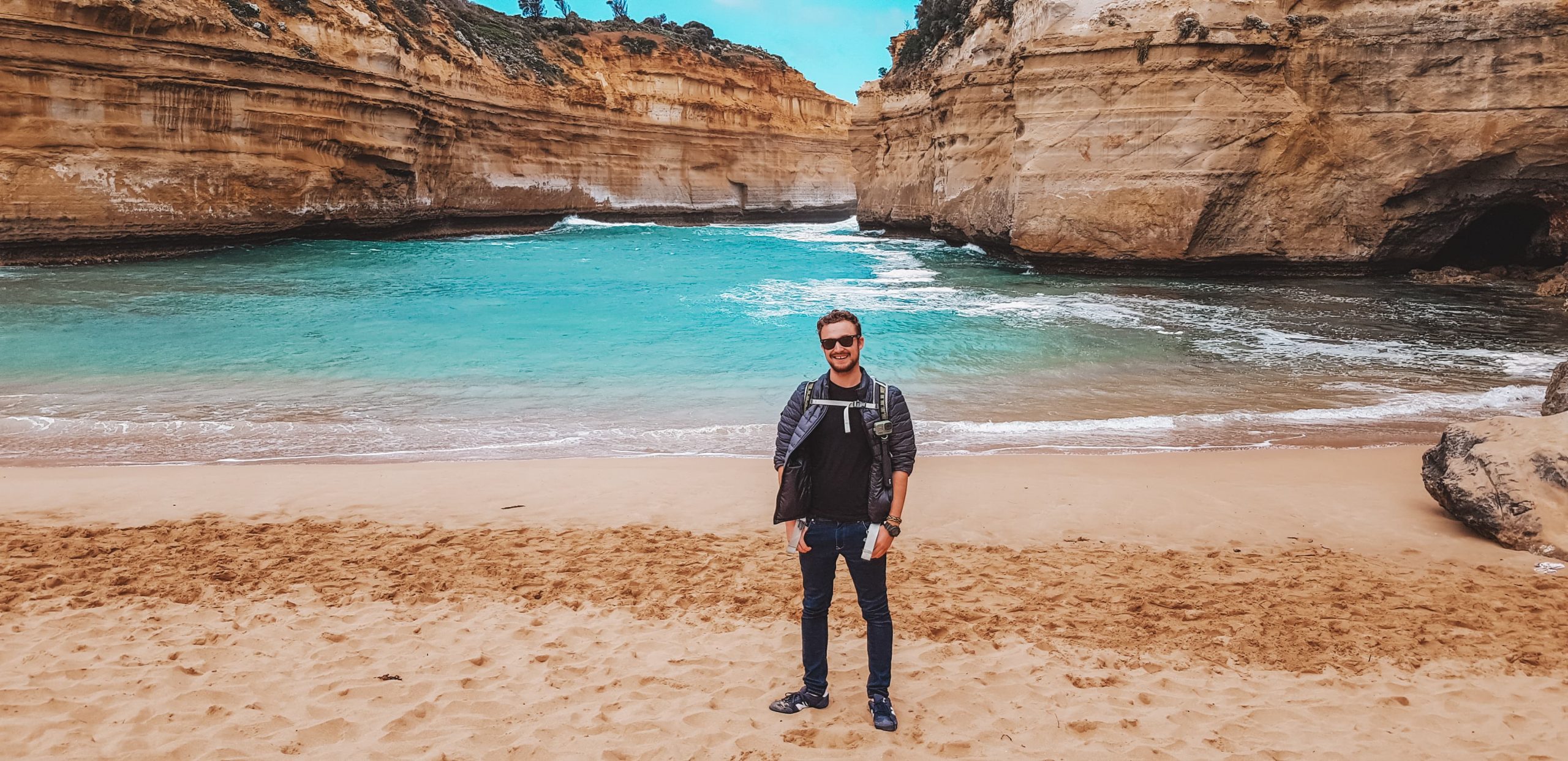 Brad at Loch Ard Gorge in Australia on a tour of the Great Ocean Road