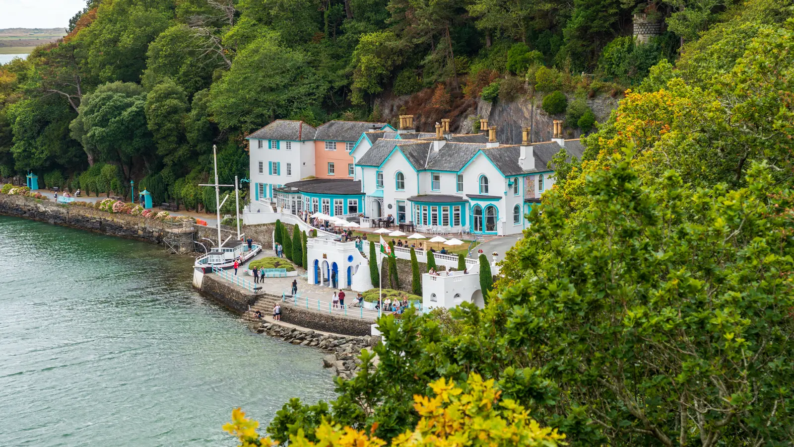 Hotel Portmeirion 16x9 1. Hotel Portmeirion and its waterfront terrace overlooking the Dwyryd Estuary in North Wales.